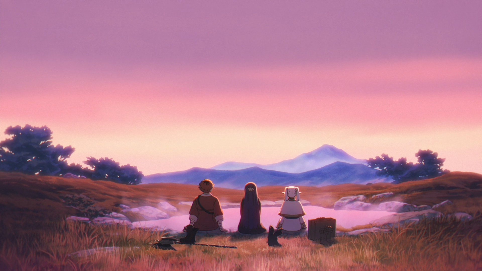 HD PC anime desktop wallpaper of Stark, Fern, and Frieren (Frieren: Beyond Journey's End) sitting on a hillside at sunset, backs to viewer, gazing toward distant mountains.