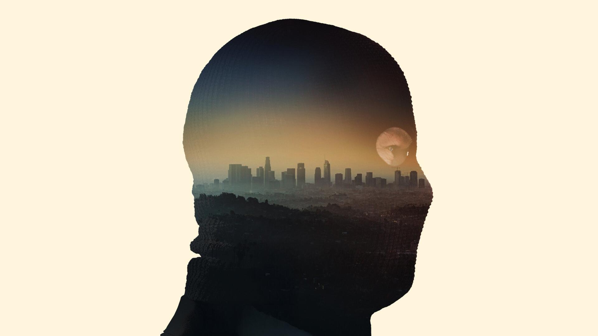 Crime 101 4K Ultra HD PC desktop wallpaper and background: double-exposure silhouette of a head with a moody city skyline at dusk.