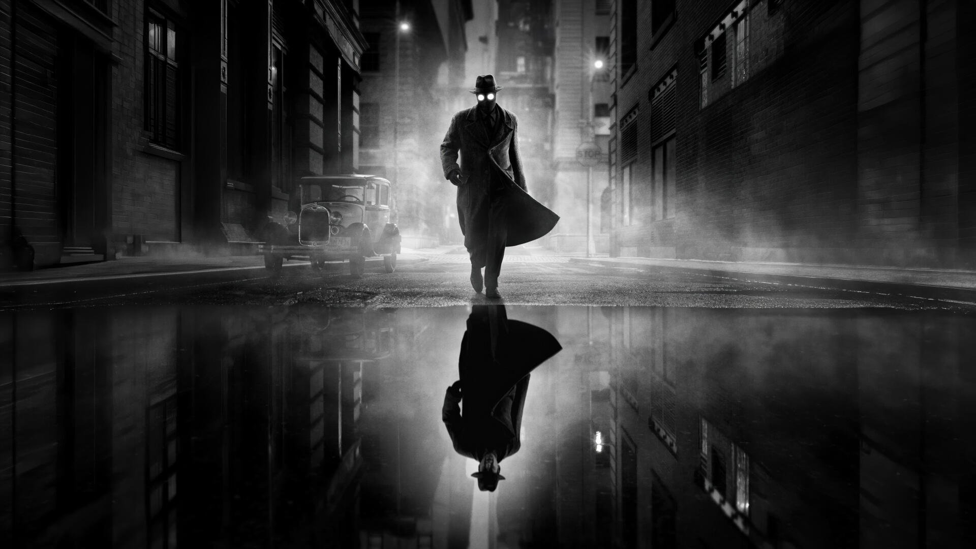 Spider-Noir 5K Ultra HD PC Desktop Wallpaper and Background — silhouette of a trenchcoat figure with glowing eyes striding through a foggy noir city street, mirrored in wet pavement.