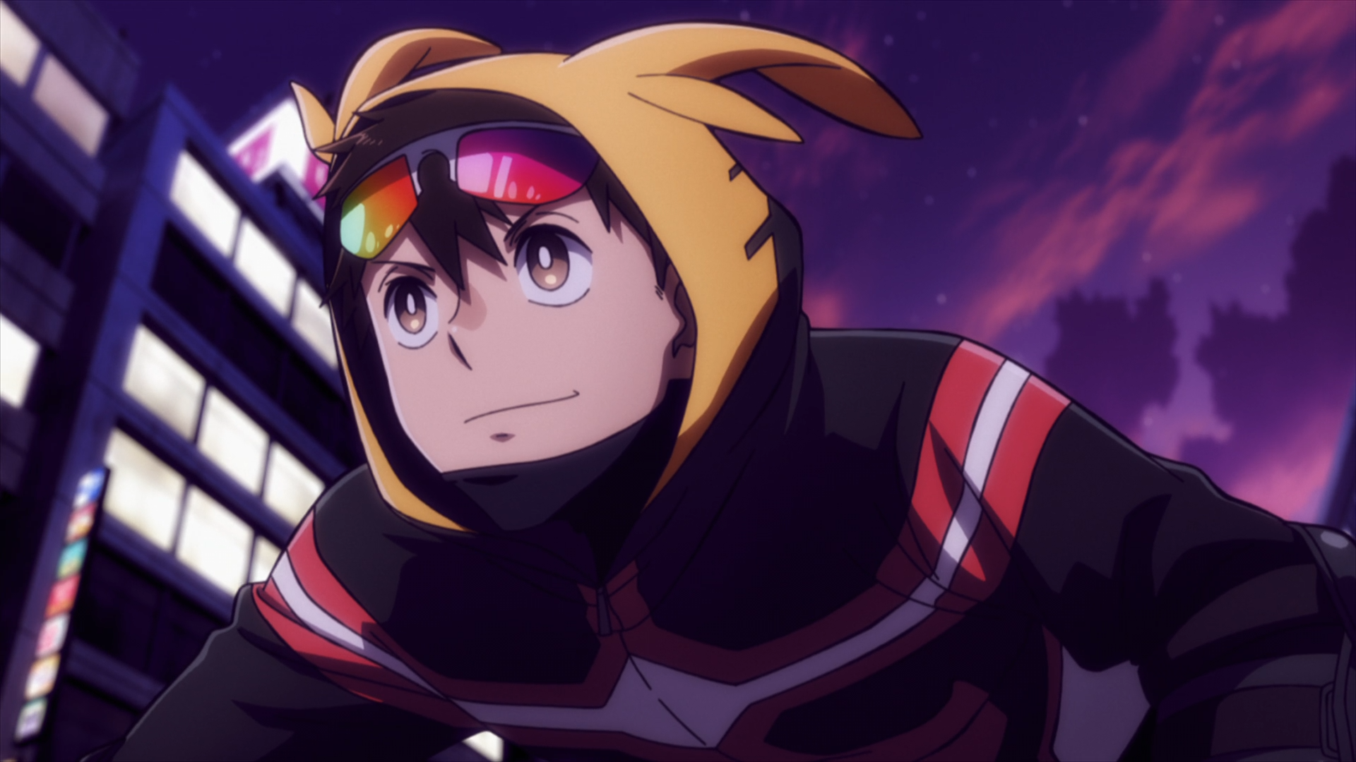 HD PC desktop wallpaper of Koichi Haimawari from My Hero Academia: Vigilantes (My Hero Academia), in a yellow hood with goggles, smiling against a purple night cityscape.