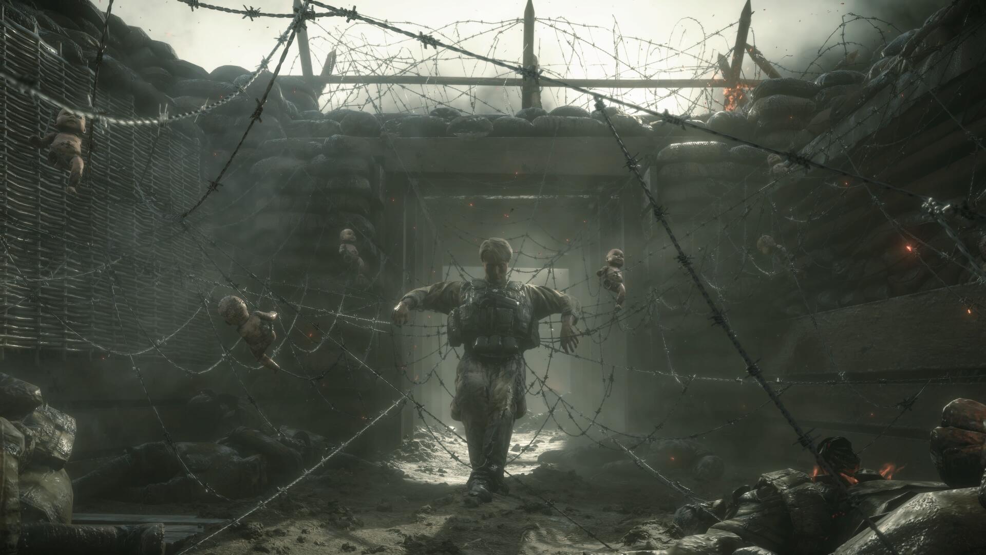 Death Stranding 4K Ultra HD PC wallpaper: lone porter walks through a barbed-wire, ruined tunnel carrying stacked cargo, silhouetted by pale backlight in a foggy, post-apocalyptic scene.