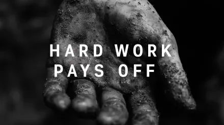 Black-and-white HD PC wallpaper: a dirt-streaked hand reaching out with bold text HARD WORK PAYS OFF as a motivational quote background.