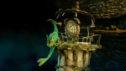 4K Ultra HD PC desktop wallpaper of a video game Keeper: a green peacock-like bird perched on a mossy stone pillar beside an ornate cage in a dim cavern.