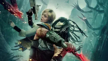 Predator: Badlands 4K Ultra HD PC desktop wallpaper — a blonde survivor in a misty forest is grabbed by a dreadlocked Predator wielding glowing wrist blades.