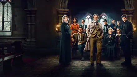 Movie HD PC desktop wallpaper: Wake Up Dead Man: A Knives Out Mystery — moody manor interior with a gathered ensemble of well-dressed figures framed by stained-glass windows.