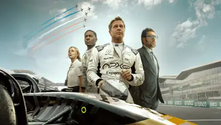 F1 (2025) 4K Ultra HD PC desktop wallpaper: an F1 driver in suit holds his helmet beside teammates and a race car on the grid, jets streak the cloudy sky.