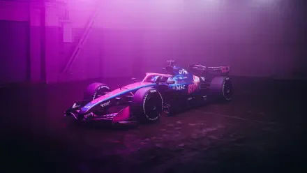 Pink Alpine F1 Team race vehicle parked in a moody garage, rendered as a 4K Ultra HD PC desktop wallpaper and background.