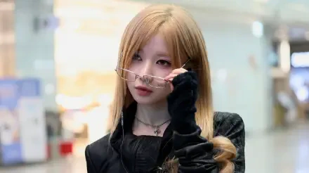  BABYMONSTER - Asa modeling stylishly in blonde hair with glasses