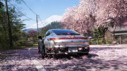 Forza Horizon 6 video game 4K Ultra HD PC wallpaper: rear view of a Porsche driving down a road carpeted in sakura petals beneath blooming cherry trees.