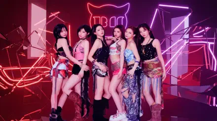 K-pop girl group on a neon-lit Choom stage, members in colorful stage outfits posing amid geometric light accents — 5K Ultra HD PC desktop wallpaper and background.