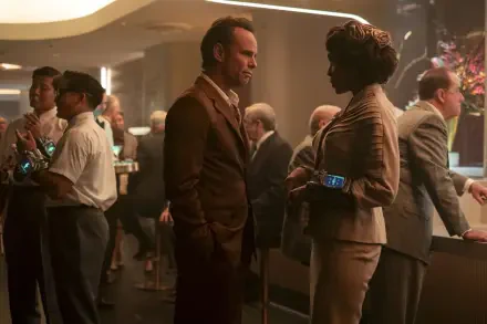 HD PC desktop wallpaper and background — Fallout (TV Show): two characters converse in a retro-futuristic casino lounge, warm cinematic lighting and patrons in the background.