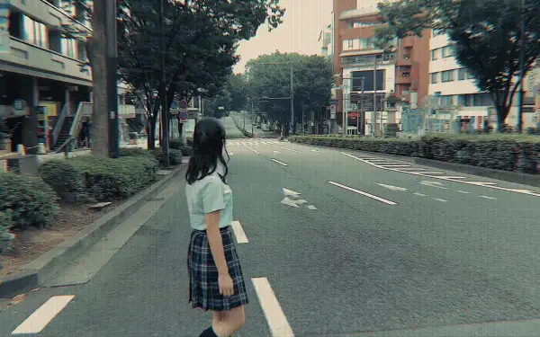 HD PC desktop wallpaper/background inspired by Japanese TV show Alice in Borderland: lone schoolgirl in uniform stands on an empty city street, muted tones and an eerie atmosphere.