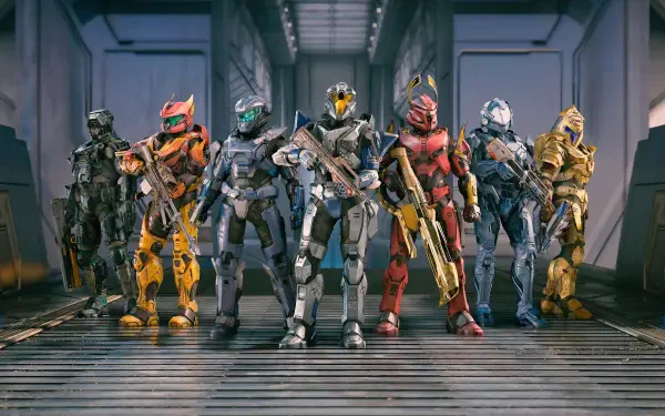 Halo Infinite HD PC desktop wallpaper showing seven armored Spartan soldiers in colorful Mjolnir armor standing in formation inside a metallic hangar, weapons ready.