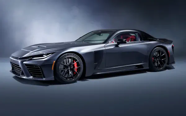 Sleek dark-gray Toyota GR GT supercar in studio lighting, presented as an 8K Ultra HD PC desktop wallpaper and background.