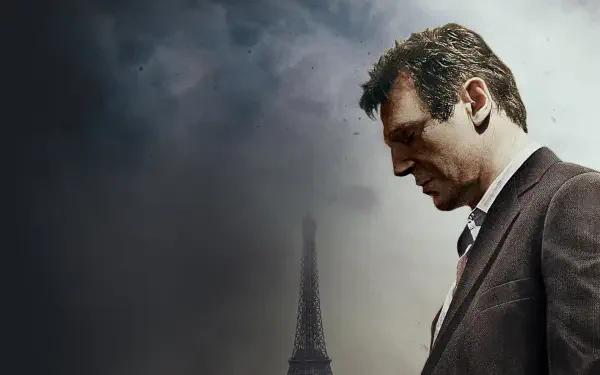 4K Ultra HD PC desktop wallpaper background: brooding man in a suit gazing down through fog with the Eiffel Tower silhouette, cinematic Taken–tagged composition.