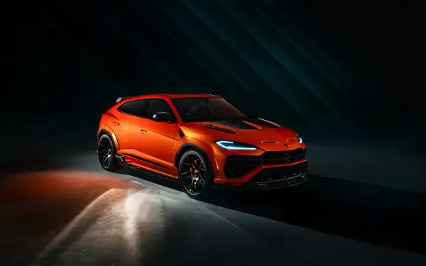 Orange Lamborghini Urus SUV in dramatic lighting, high-detail 8K Ultra HD PC desktop wallpaper background.