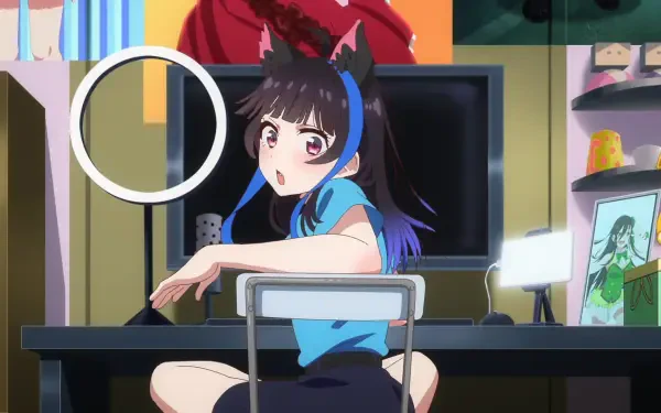 Anime HD PC desktop wallpaper of Mini Yaemori from Rent-A-Girlfriend, sitting at a desk, glancing over her shoulder before a TV monitor and framed photo in a colorful room.