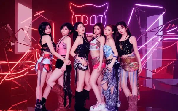 K-pop girl group on a neon-lit Choom stage, members in colorful stage outfits posing amid geometric light accents — 5K Ultra HD PC desktop wallpaper and background.