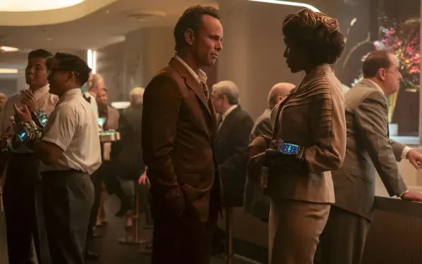 HD PC desktop wallpaper and background — Fallout (TV Show): two characters converse in a retro-futuristic casino lounge, warm cinematic lighting and patrons in the background.