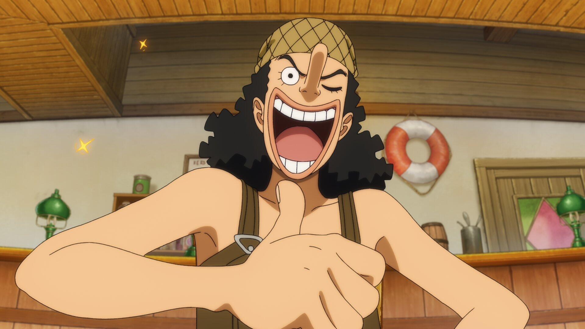 HD PC desktop wallpaper: Anime Usopp (One Piece / The One Piece) grinning broadly and giving a thumbs-up inside a cozy ship cabin, bright colors and a life preserver in the background.
