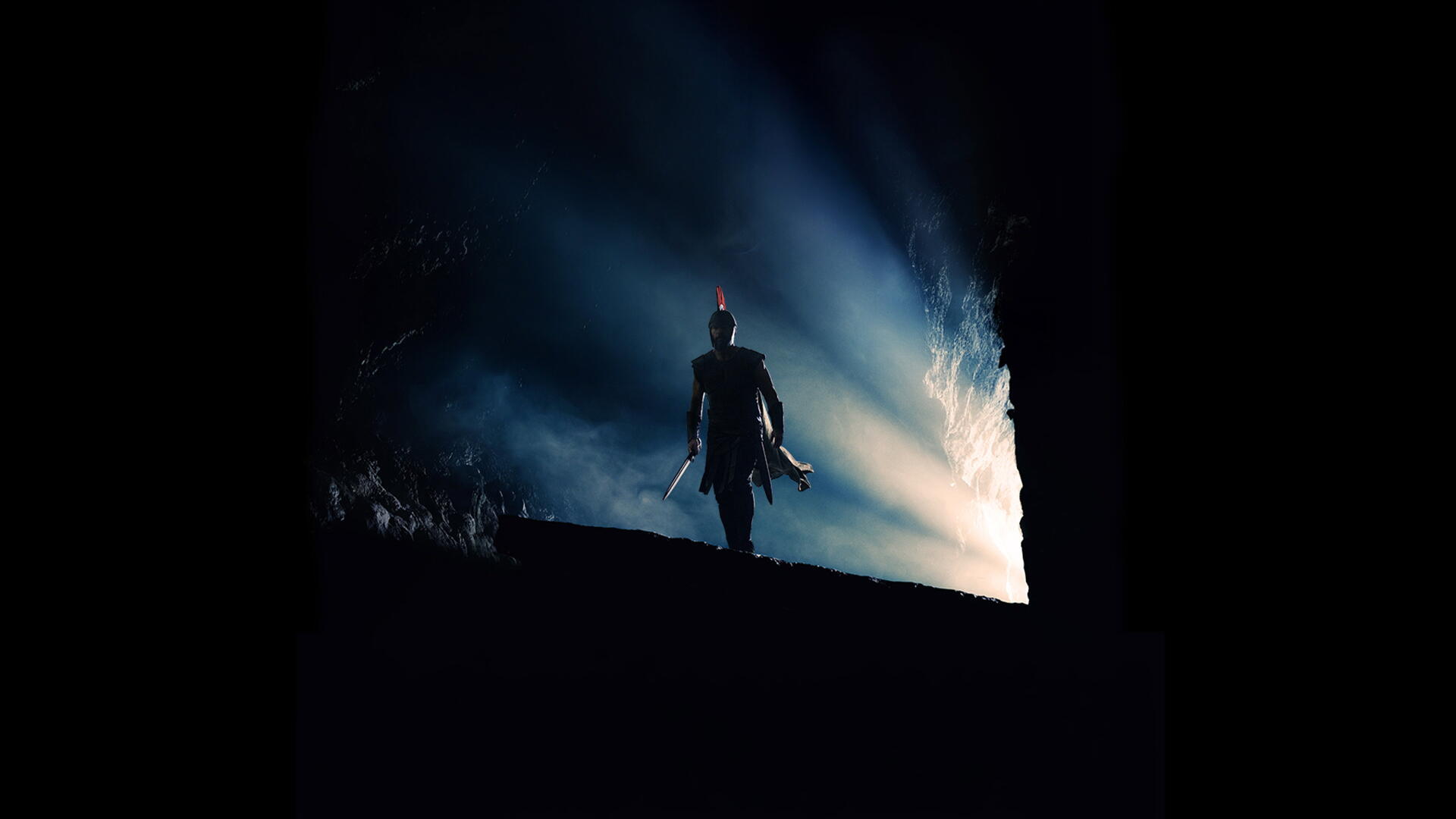 Silhouetted warrior on a dark ridge, backlit by dramatic blue-white light — The Odyssey (2026) 4K Ultra HD PC desktop wallpaper and background.