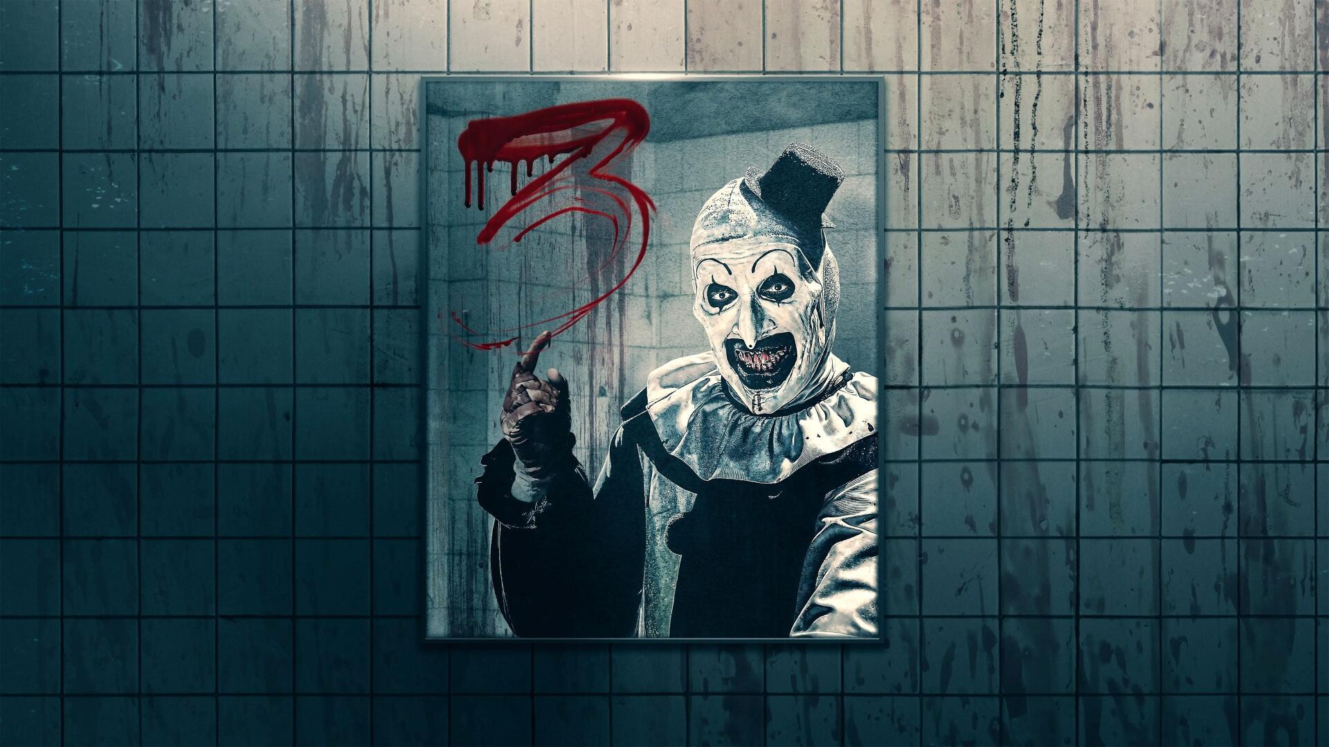 Terrifier 3 4K Ultra HD PC desktop wallpaper: a grinning white-faced clown in black-and-white costume and tiny top hat holds a bloody knife against a blood-streaked tiled wall under a red 3.