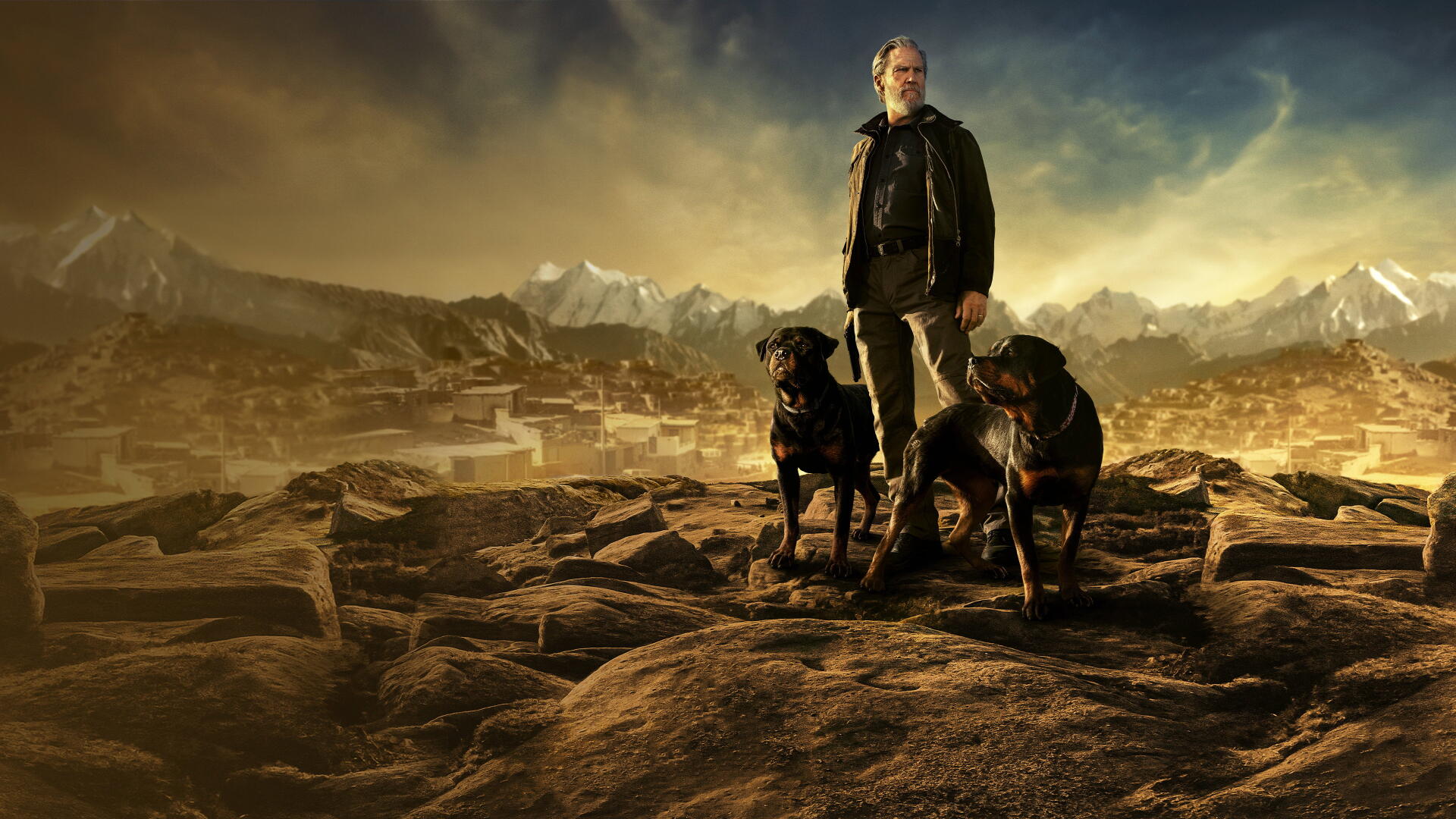 The Old Man: rugged figure with two dogs on a rocky plateau overlooking golden mountains and a distant city — dramatic 4K Ultra HD PC desktop wallpaper background