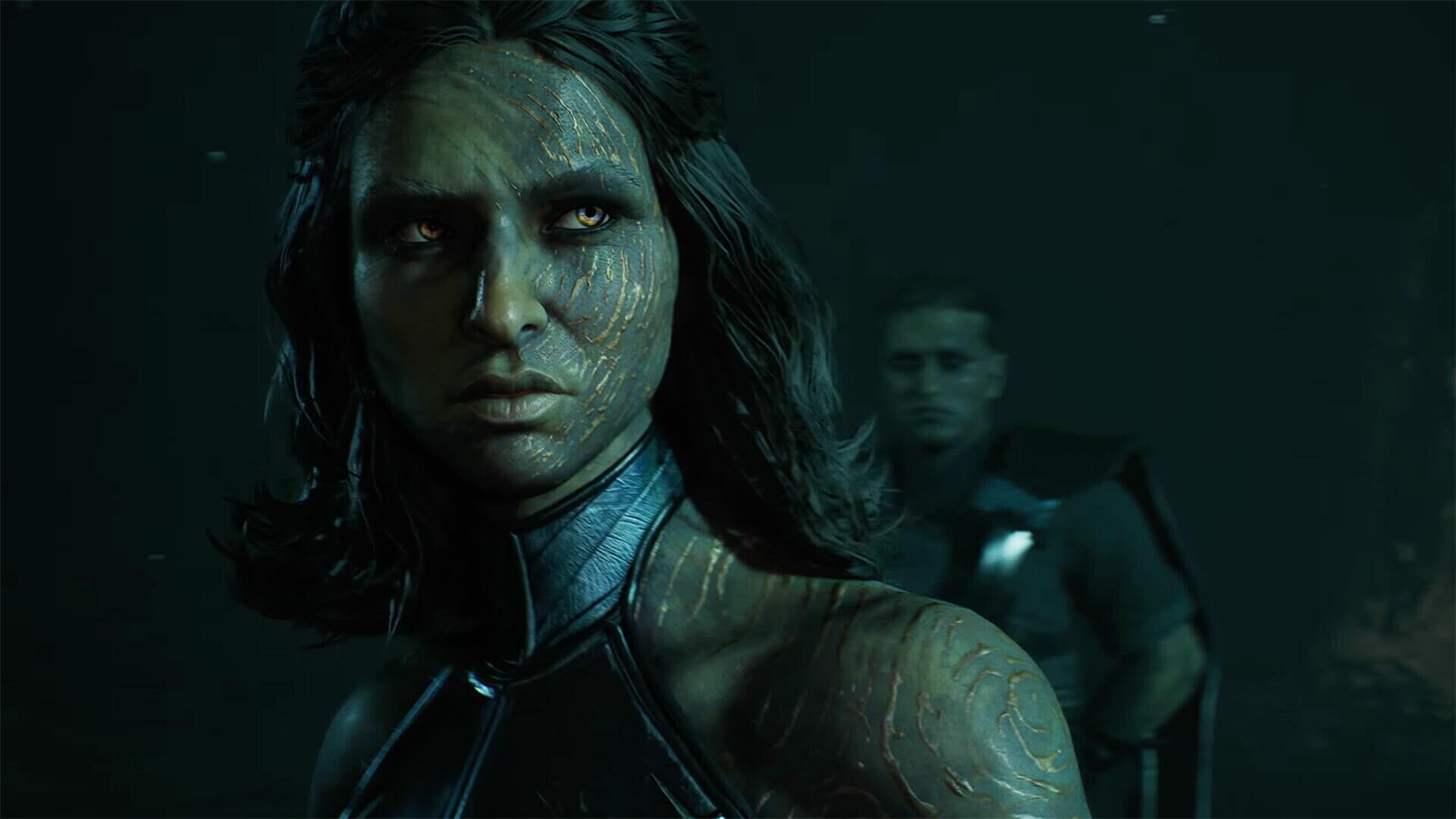 HD PC desktop wallpaper from Star Wars: Zero Company depicting Kundri Fathom — a textured-skinned alien woman with glowing eyes in green light, a blurred figure standing behind her.