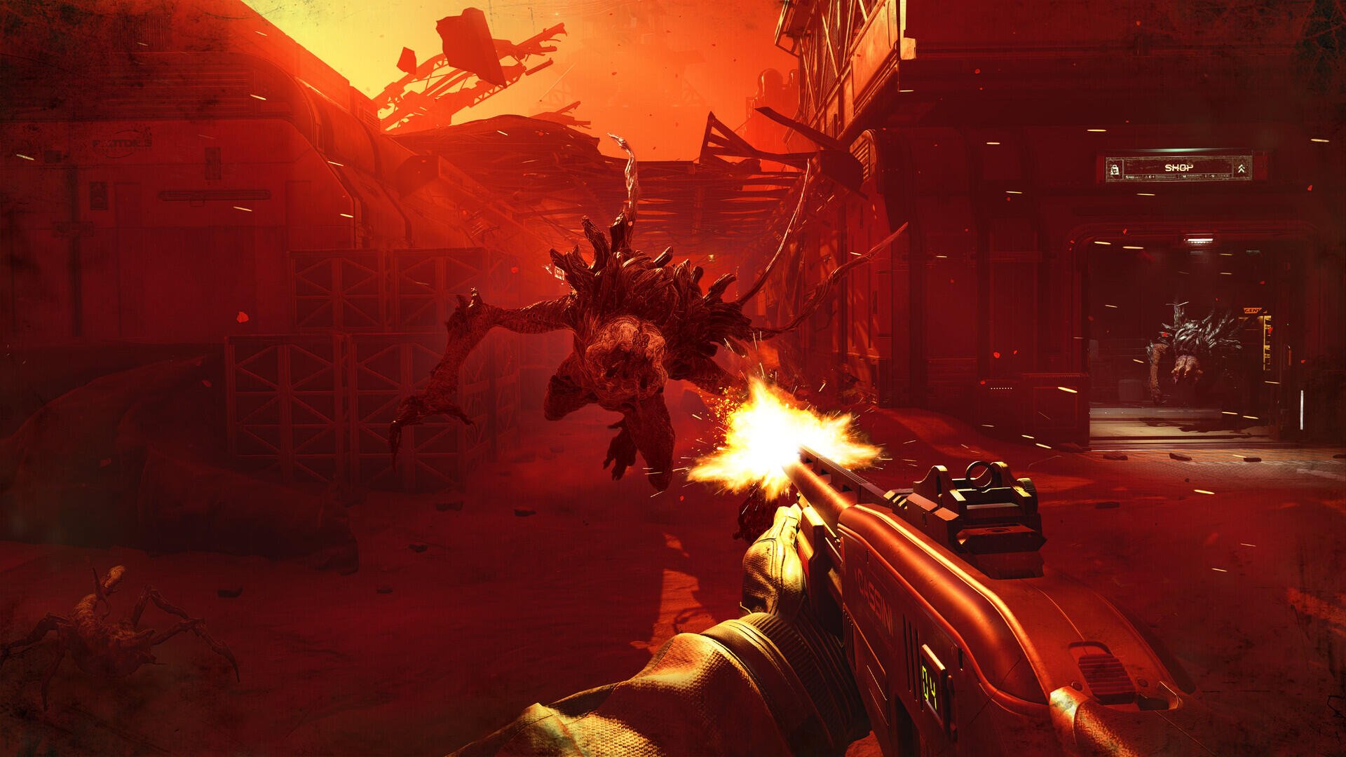 HD PC desktop wallpaper from the video game Alien Deathstorm: first-person gunfire at a towering alien monster amid a fiery urban battlefield.