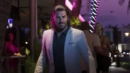 Raul Bautista from Grand Theft Auto VI in a neon-lit club, video game 4K Ultra HD PC desktop wallpaper showing the character in a white suit with a determined expression.