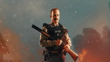 4K Ultra HD PC desktop wallpaper: a stern tactical officer in armored vest holds a shotgun across his chest amid smoky orange-blue battlefield lighting.