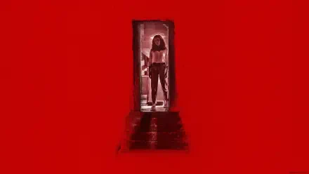 Barbarian (2022) 4K Ultra HD PC desktop wallpaper: lone figure framed in a narrow doorway, silhouetted against a stark blood-red background with steps leading up.