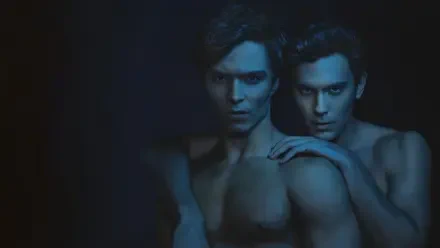 4K Ultra HD PC wallpaper for Monsters: The Lyle and Erik Menendez History showing two shirtless young men in blue light, one with a hand resting on the other's shoulder.
