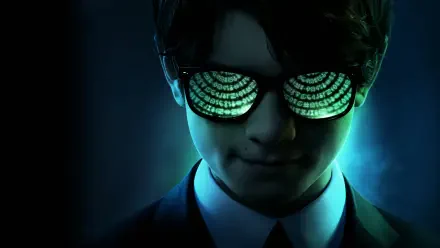 Artemis Fowl portrait: young man in suit, green binary code reflected in sunglasses, shadowed face with teal backlight — 4K Ultra HD PC desktop wallpaper/background.