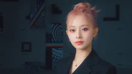 5K Ultra HD wallpaper: close-up portrait of a young woman with pink hair in a black blazer against a dark geometric background, K-pop–styled Taiwanese aesthetic.