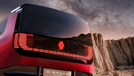 Renault E-Space concept car against a rocky landscape, featured in an HD desktop wallpaper background.