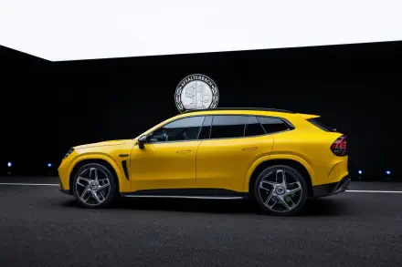 Yellow Mercedes-AMG GT SUV in a dramatic studio setting, 2K Quad HD PC desktop wallpaper background.