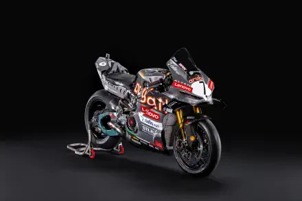 Ducati Panigale V4 R racing superbike on a dark studio background, featured in an 8K Ultra HD desktop wallpaper.