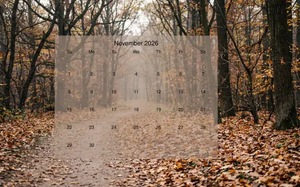 Autumn forest path with fallen leaves and tall trees, translucent centered November 2026 calendar overlay; 5K Ultra HD PC desktop wallpaper and background.
