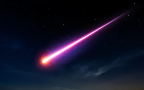 Vivid meteor with glowing orange head and magenta trail streaking across a starry night sky — 5K Ultra HD PC desktop wallpaper and background.