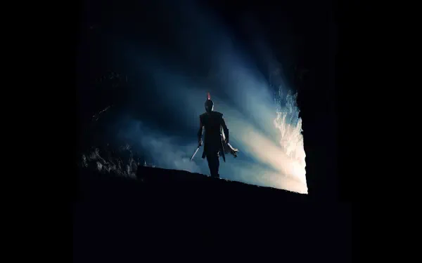 Silhouetted warrior on a dark ridge, backlit by dramatic blue-white light — The Odyssey (2026) 4K Ultra HD PC desktop wallpaper and background.