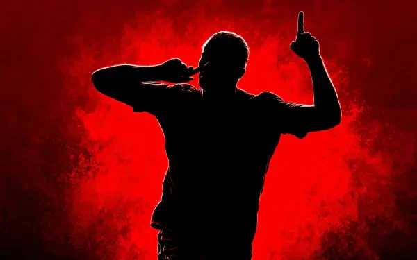 Silhouette of a celebrating footballer raising one finger against a textured red backdrop — dramatic 4K Ultra HD PC desktop wallpaper.