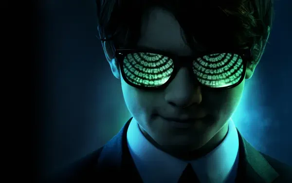 Artemis Fowl portrait: young man in suit, green binary code reflected in sunglasses, shadowed face with teal backlight — 4K Ultra HD PC desktop wallpaper/background.