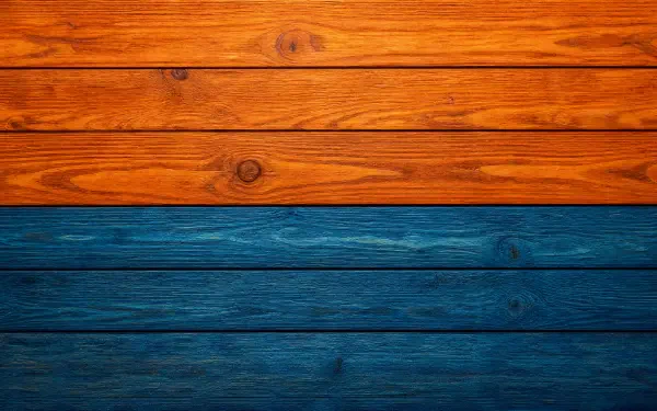 4K Ultra HD PC desktop wallpaper of horizontal wood planks: warm orange top and deep blue bottom with pronounced wood grain texture.
