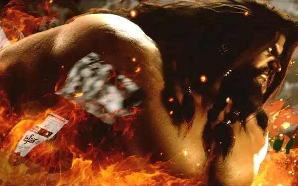 HD PC desktop wallpaper/background: Street Fighter 6's Arjun with a woman surrounded by roaring flames, a dramatic fiery scene