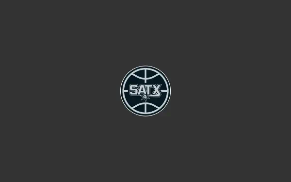 San Antonio Spurs NBA 2K Quad HD PC desktop wallpaper: dark gray background with a centered circular SATX basketball logo in silver and white.