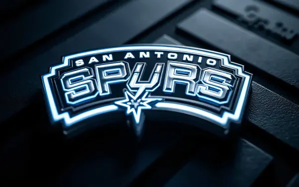 Glowing San Antonio Spurs NBA logo in neon blue on a dark textured surface — 4K Ultra HD PC desktop wallpaper.