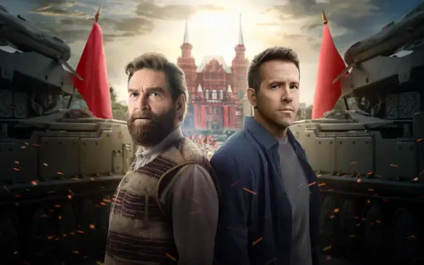 Mayday 4K Ultra HD PC desktop wallpaper and background: two stern men back-to-back amid tanks and red flags before a red‑spired cathedral under smoky skies with flying embers