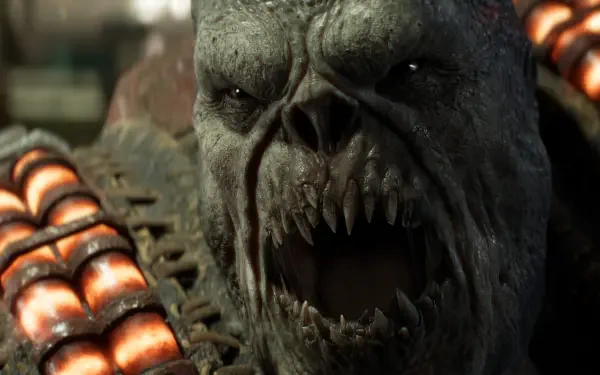 Gears of War: E-Day 2K Quad HD PC wallpaper — close-up of a snarling Gears of War alien/monster with jagged teeth and glowing armored ammo tubes.
