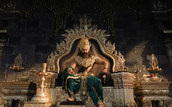 Ramayana (2026) 4K Ultra HD PC desktop wallpaper and background: a regal king seated on an ornate throne amid golden royal decor, bathed in dramatic, cinematic lighting.
